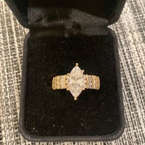 Marquise shaped Diamonique ring with baguettes and round stones.